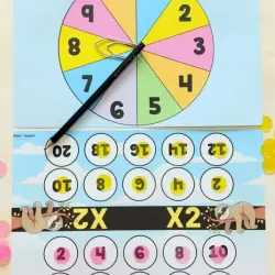 Jogo de multiplicação com cores e números para crianças.