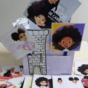 Caixa Cenário do material Amor de Cabelo com 29 cartões ilustrados e molde para atividades interativas.