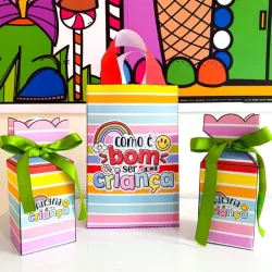 Lembrancinhas coloridas com laços verdes para o Dia das Crianças.