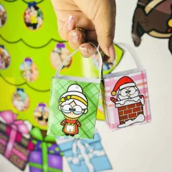 Lembrancinhas de Natal artesanais com personagens do Papai Noel.