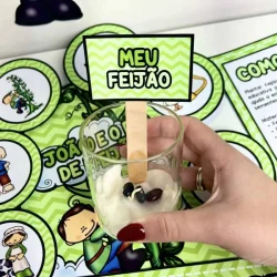 Atividade educativa com feijão e papel para crianças.