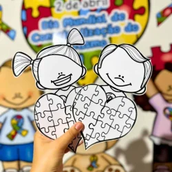 Arte educativa sobre o autismo com crianças e quebra-cabeças.