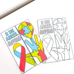 Material de atividades com quebra-cabeça e fita de conscientização do autismo.