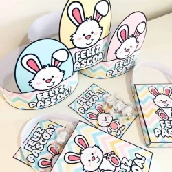 Lembrancinhas de Páscoa com coelhinhos de papel decorativo.