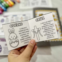 Imagem de símbolo da Páscoa com cruz, coelho e ovo de Páscoa.