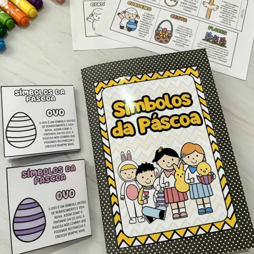 Caderno de símbolos da Páscoa com desenhos de ovos e personagens infantis.