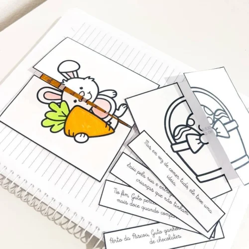 Desenho de coelhinho com cenoura para atividades de Páscoa.