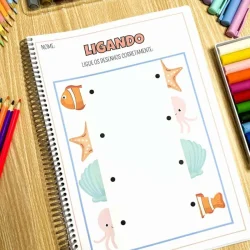 Atividade de simetria com desenhos de peixes e polvo para crianças.