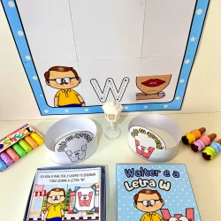 Atividade educativa com letra W e personagem Walter, materiais coloridos e quadro branco.