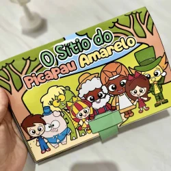 Livro infantil 3D do Sítio do Picapau Amarelo com personagens coloridos.