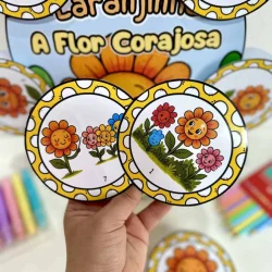 Luva com desenhos de flores e uma flor corajosa, tema do livro infantil.