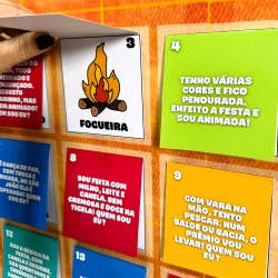 Cartões de adivinhas juninas com cores vibrantes e perguntas divertidas.