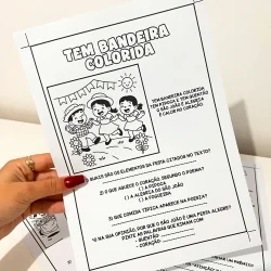 Atividade de festa junina com bandeira colorida para crianças.
