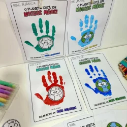 Atividade infantil com pegadas de tinta e desenhos de planeta Terra.