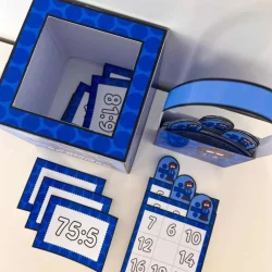 Jogo de bingo com números e divisão para atividades educativas.