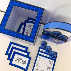 Jogo educativo de bingo com operações de divisão para crianças.