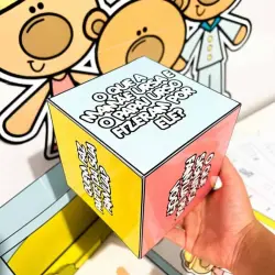 Brinquedo de papel com ursinhos e caixa colorida para crianças.