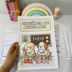 Material de atividades educativas para crianças com desenhos de cachorros.