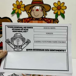 Atividade educativa com personagem de espantalho e flores para ensinar emoções.