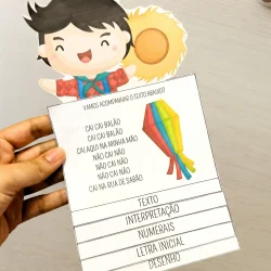 Atividades educativas com fita colorida e personagem de papel para crianças.