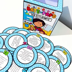 Jogo de perguntas sobre ser estudante com cartas coloridas e caixa temática.