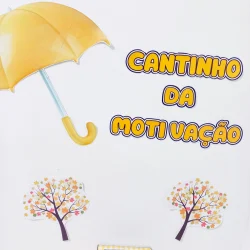 Imagem de guarda-chuva amarelo com árvores coloridas e texto motivacional.