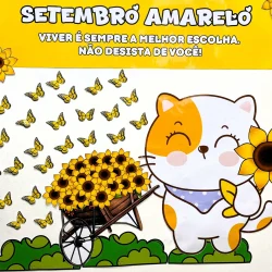 Gatinho fofo com girassóis e borboletas amarelas para Setembro Amarelo.