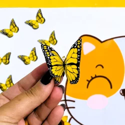 Borboleta amarela sendo colocada em painel de prevenção ao suicídio.