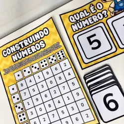 Atividade de construção de números com dados e cartões.