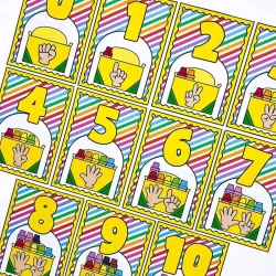 Conjunto de numerais de parede de 0 a 10 com desenhos coloridos e giz de cera.