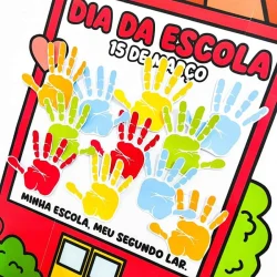 Cartaz colorido do Dia da Escola com mãos pintadas e mensagem.