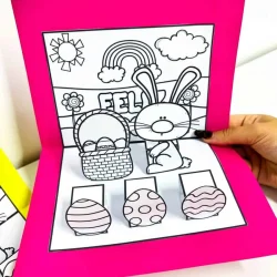 Página de atividade de Páscoa com coelho, ovos e arco-íris para colorir.