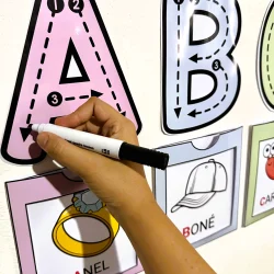 Atividade de letras com pontos e setas para colorir e aprender o alfabeto.