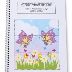 Caderno de atividades com desenho de menina e arco-íris para alfabetização.