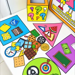 Caixa com formas geométricas coloridas e objetos educativos para crianças.